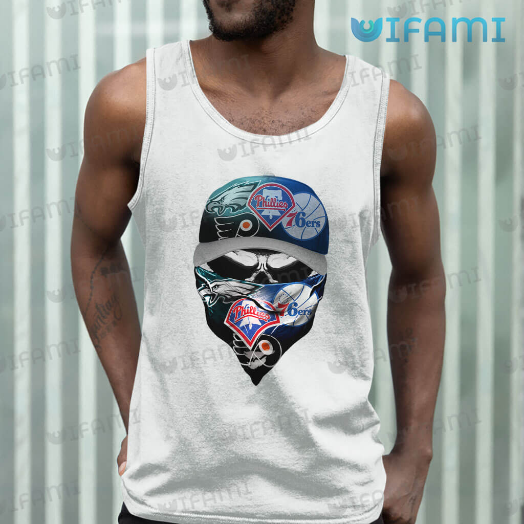 https://images.uifami.com/wp-content/uploads/2023/02/Philadelphia-Eagles-Shirt-Skull-Wearing-Mask-Phillies-Flyers-76ers-Eagles-Tank-Top.jpeg